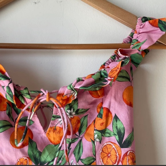 Dress with orange pattern - Picture 2 of 9